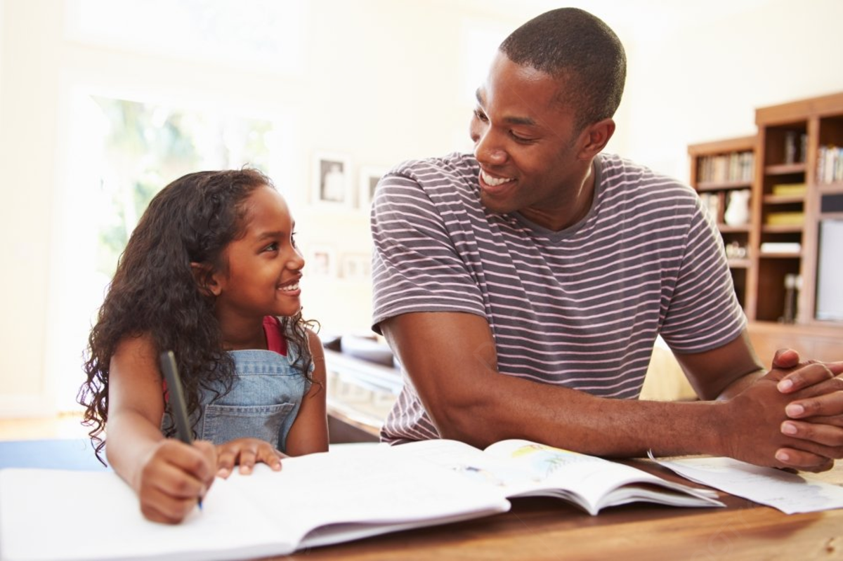 Daddy helping daughter