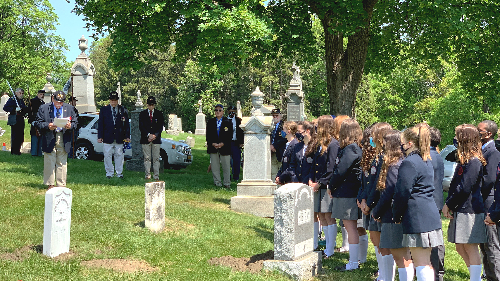 Teacher and student in public cemetery