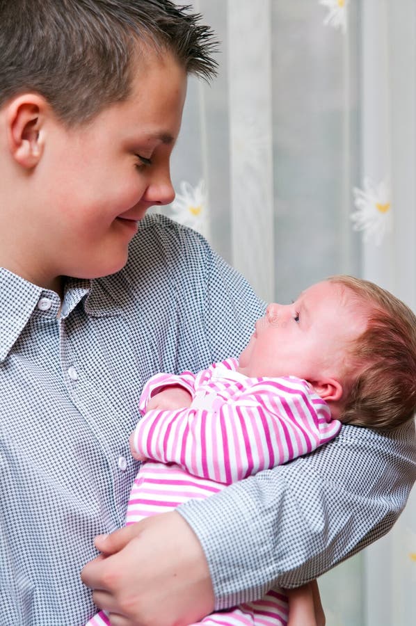 Search Results for Teenage boy and girl and baby Stock Photos and Images (1,558)