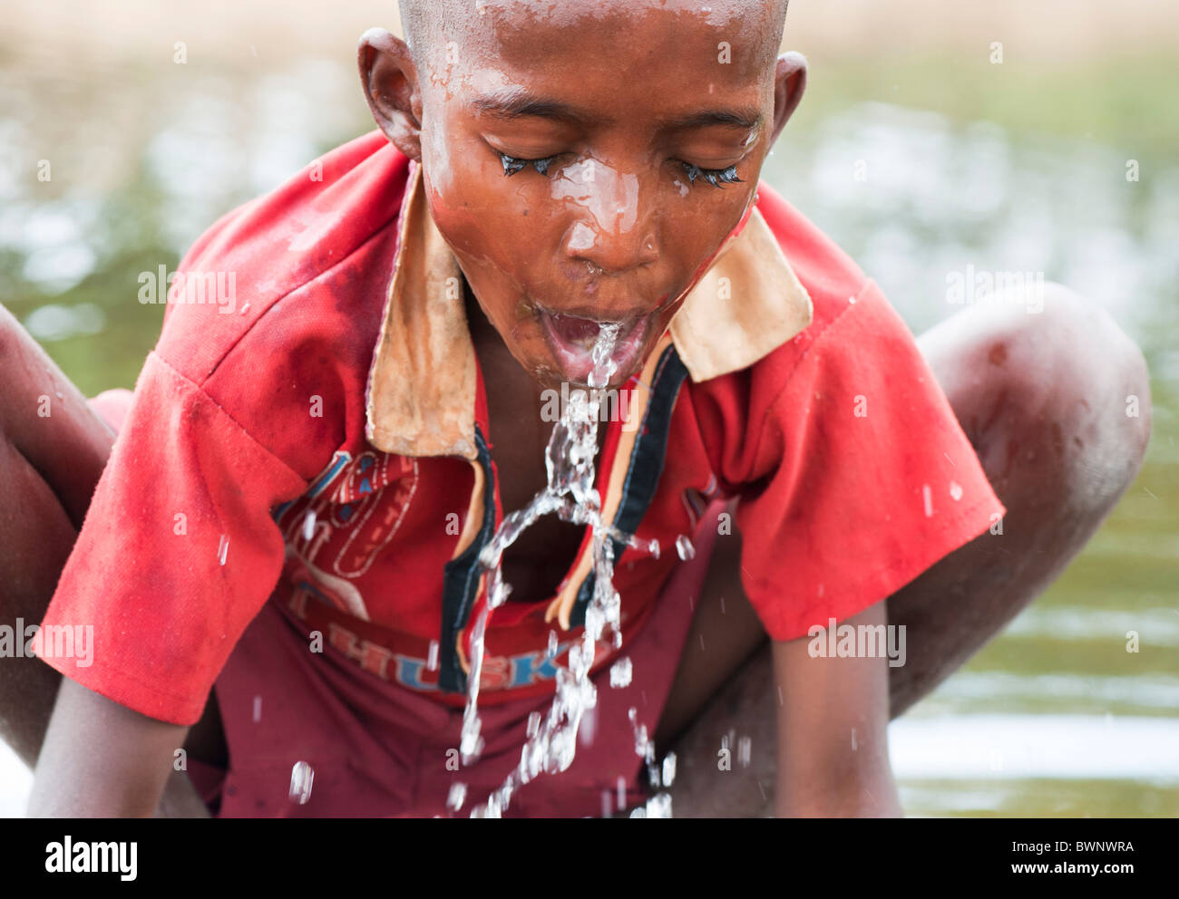 Boys wash drinking