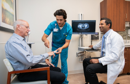 Gay male doctor involving boy into medicine