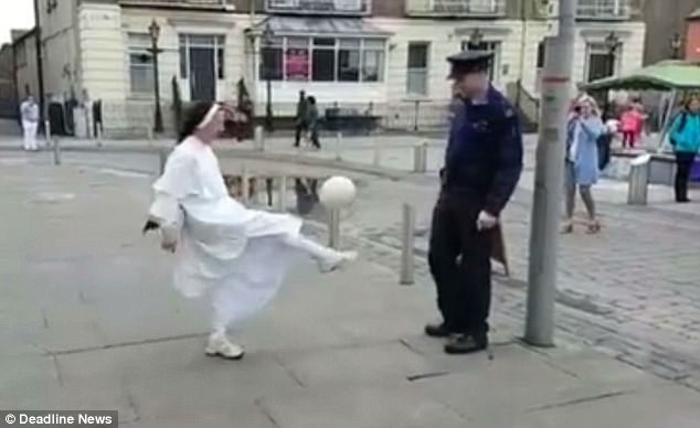 Video of nun and policeman playing soccer goes viral