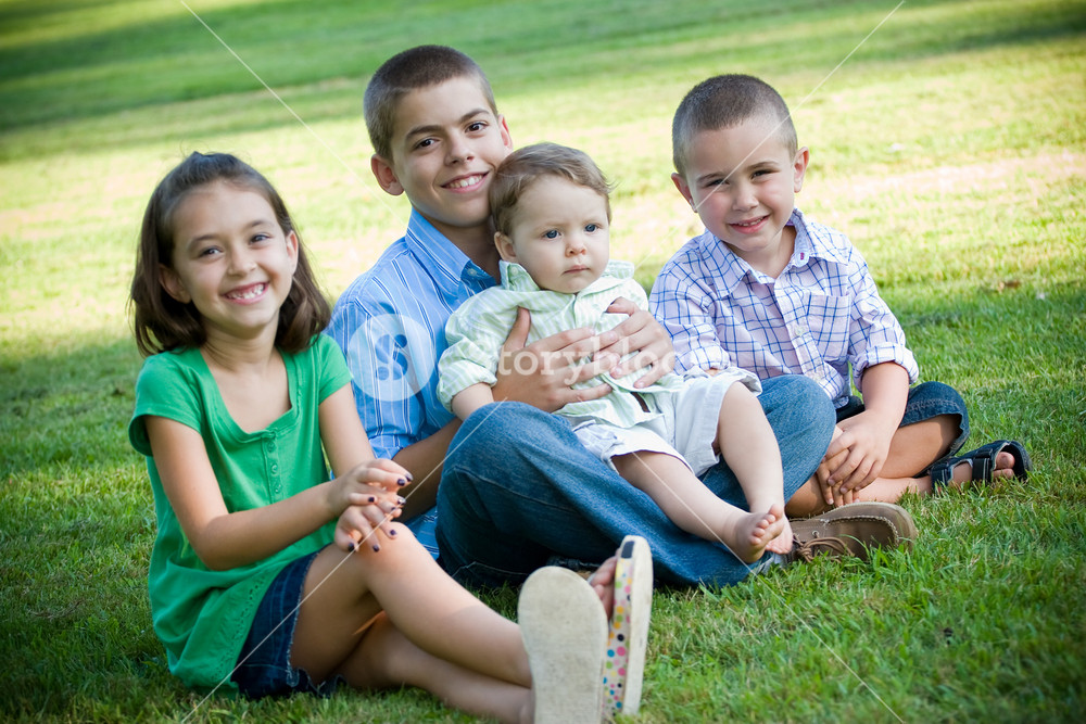 One girl three boys Black & White Stock Photos